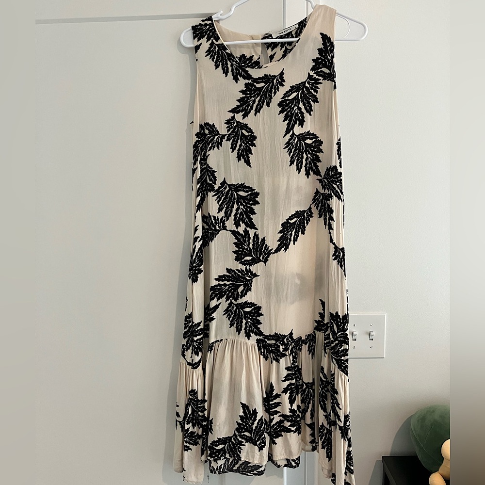 Black patterns on a white fabric maxi dress